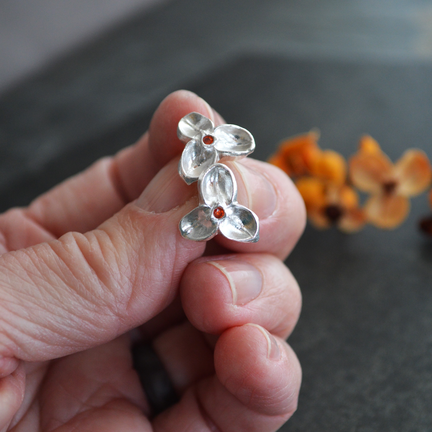 Silver Bittersweet Earrings with Orange CZ Stone