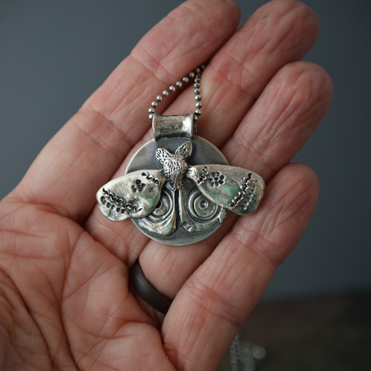 Hand-Sculpted IO Moth Pendant Necklace in Silver